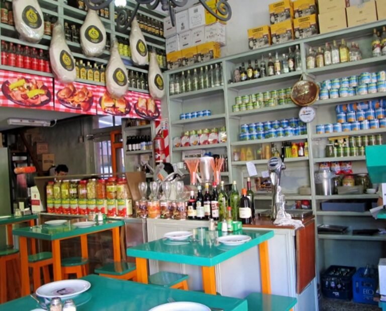 botellas de oleo calcareo en un estante