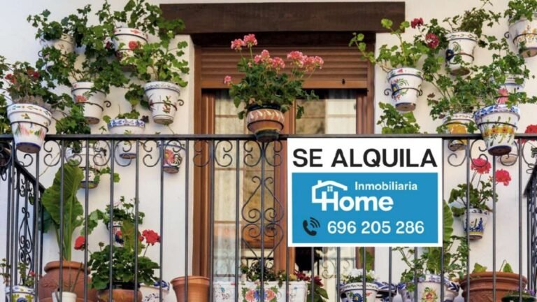 casa con letrero de alquiler y venta