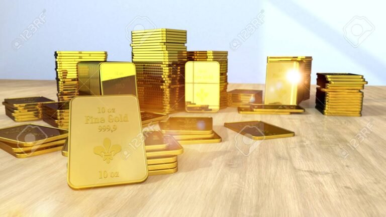 lingotes de oro sobre una mesa de madera